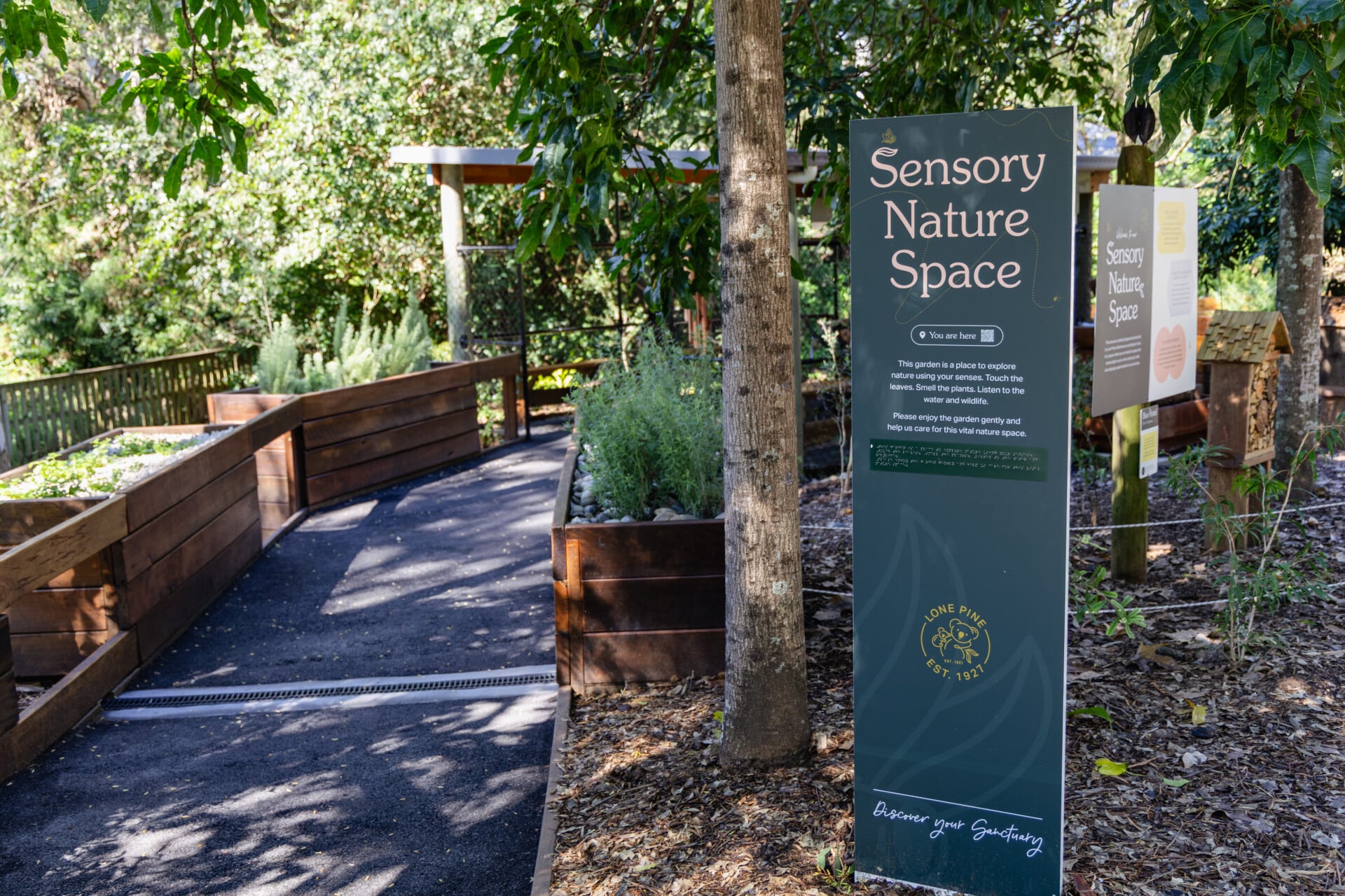 The sensory garden, a planted space with a central gazebo and seating.